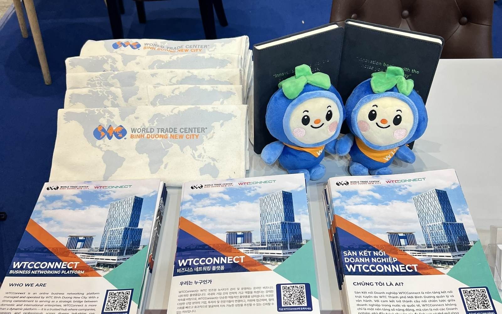BIDU mascot plush figures with World Trade Center Binh Duong New City branded totes and WTCConnect materials