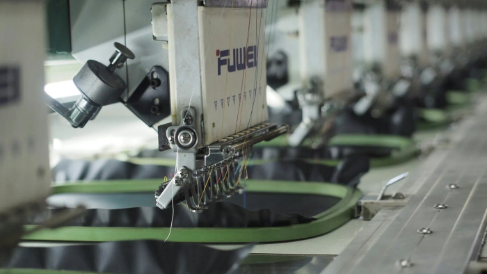 Computerized embroidery and export finishing line for custom plush toys