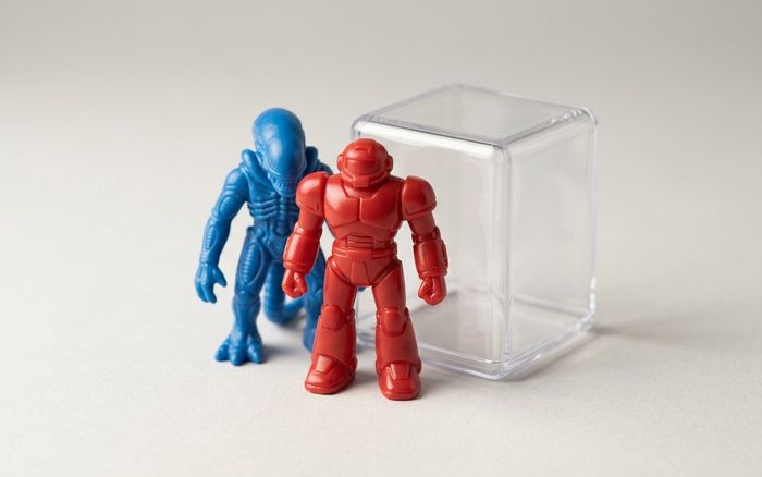 Precision injection-molded PVC collectible figures and acrylic display case