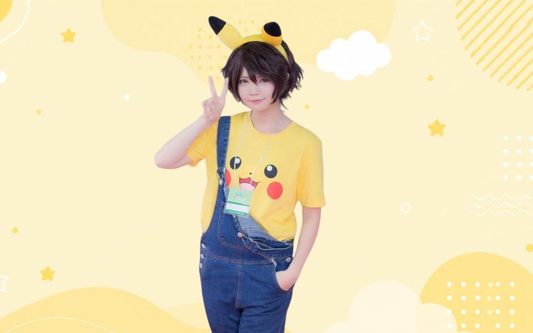 Model wearing Pikachu ear headband and Pikachu-print t-shirt from the Pokémon apparel rollout